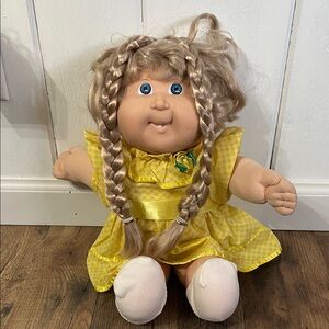1987 Cabbage Patch Kid hair growing doll with braids in original yellow dress